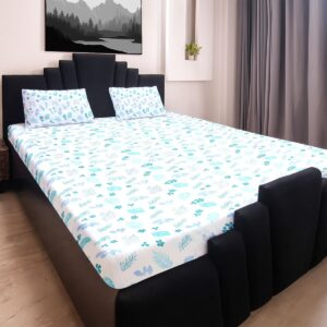 QIaqM7FfT0K07_PzuWchei0W.jpg King size bedsheet with botanical print and two matching pillow covers on a bed