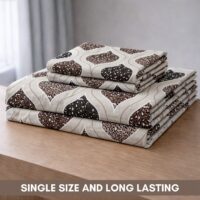 tf89jawWuiO7vikGa6J5Utbo-5.jpg Folded single bedsheets with a leopard print pattern on a wooden surface